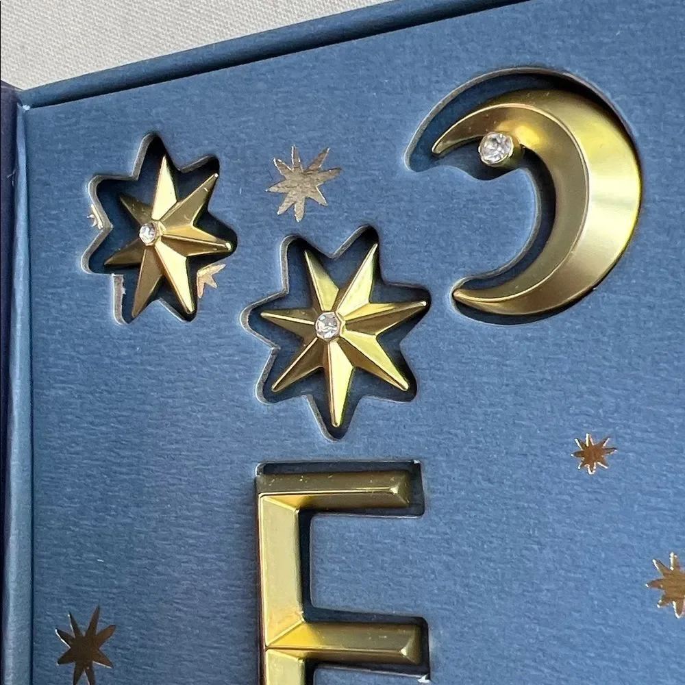 Anthropologie Gold Star and Moon Candle Charms